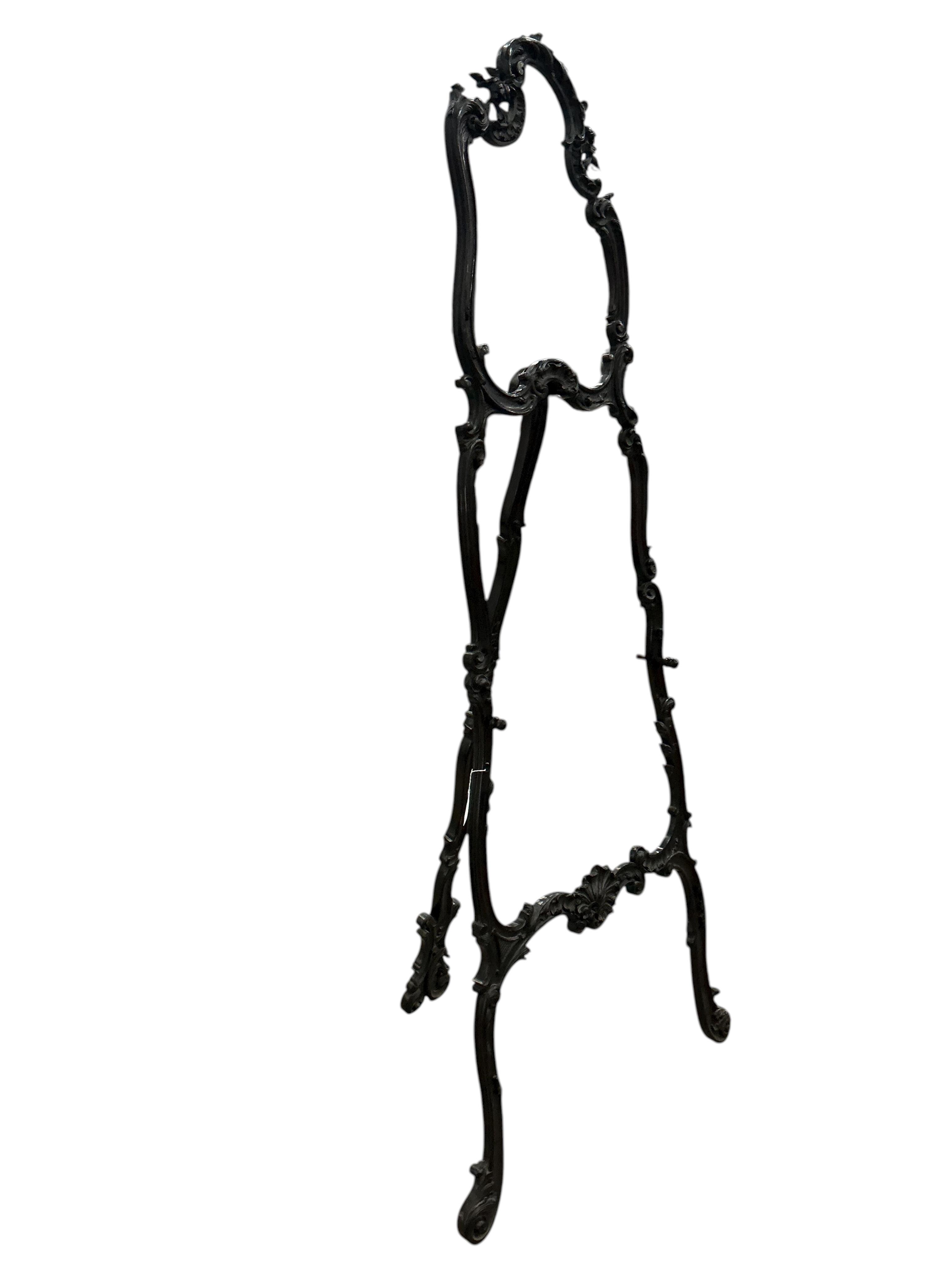 A Chippendale Revival mahogany easel, width 76cm, height 180cm